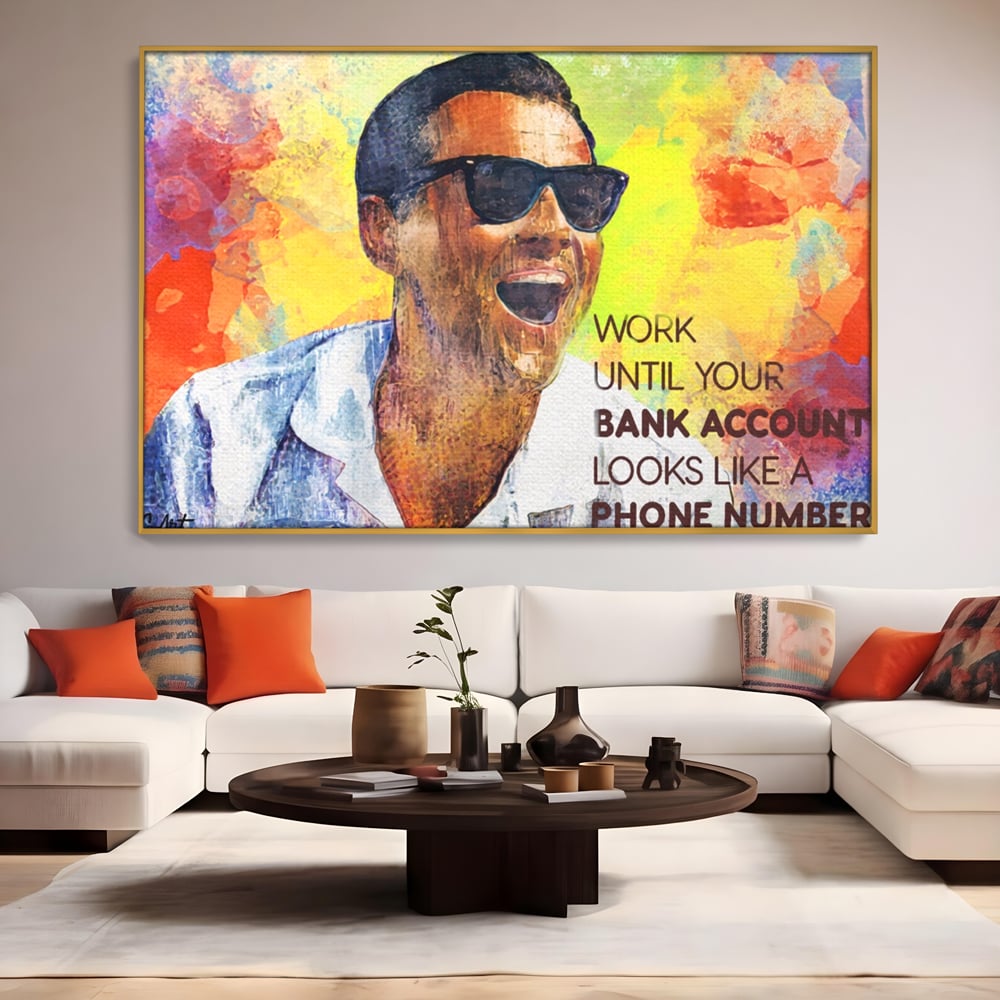 Tablou canvas cu tablou motivational cu portretul lui leo dicaprio, in rama de aluminiu auriu, pe perete intr-un living