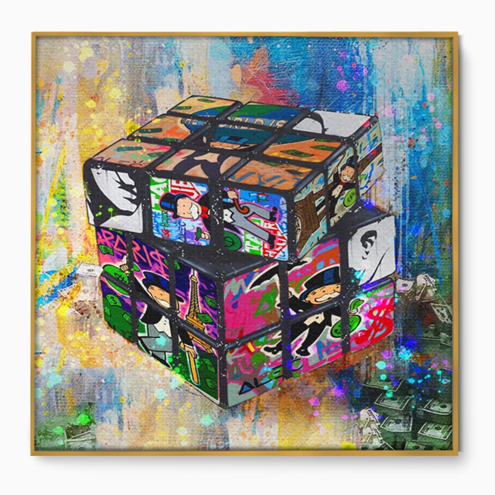 Tablou canvas cu pictura cub rubik cu monopol, in rama de aluminiu auriu