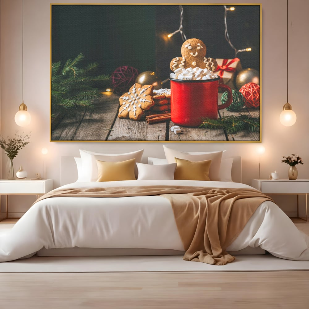 Tablou canvas cu tablou canvas cu turta dulce si cana rosie, in rama de aluminiu auriu, pe perete intr-un dormitor