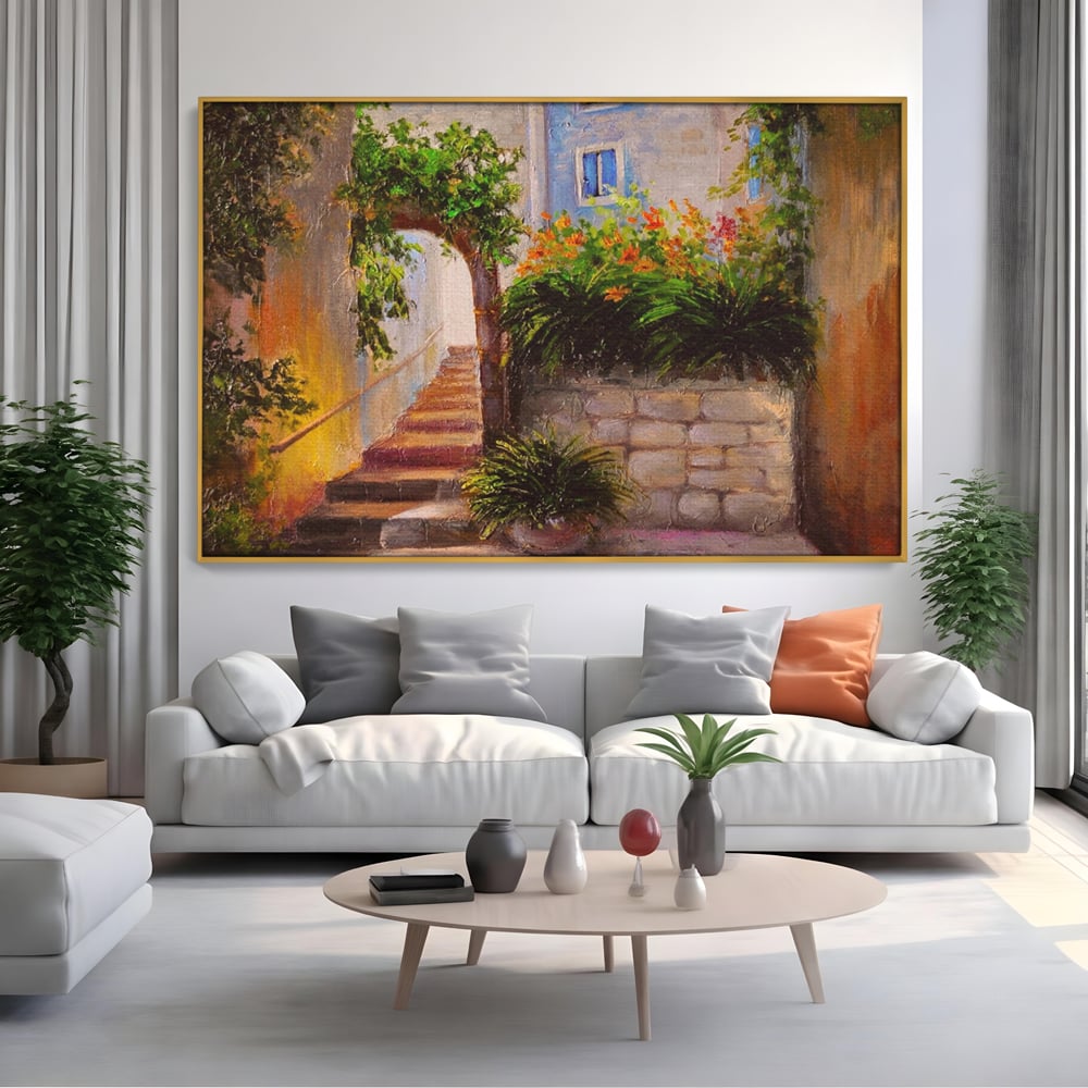 Tablou canvas cu pictura cu scari si flori, in rama de aluminiu auriu, pe perete intr-un living