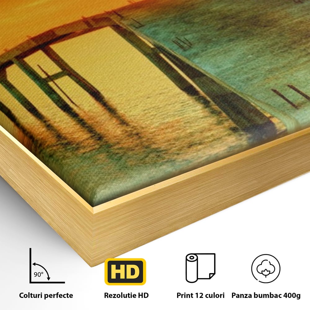 Detaliu al suprafetei: tablou canvas cu pod si rasarit de soare, in rama de aluminiu auriu
