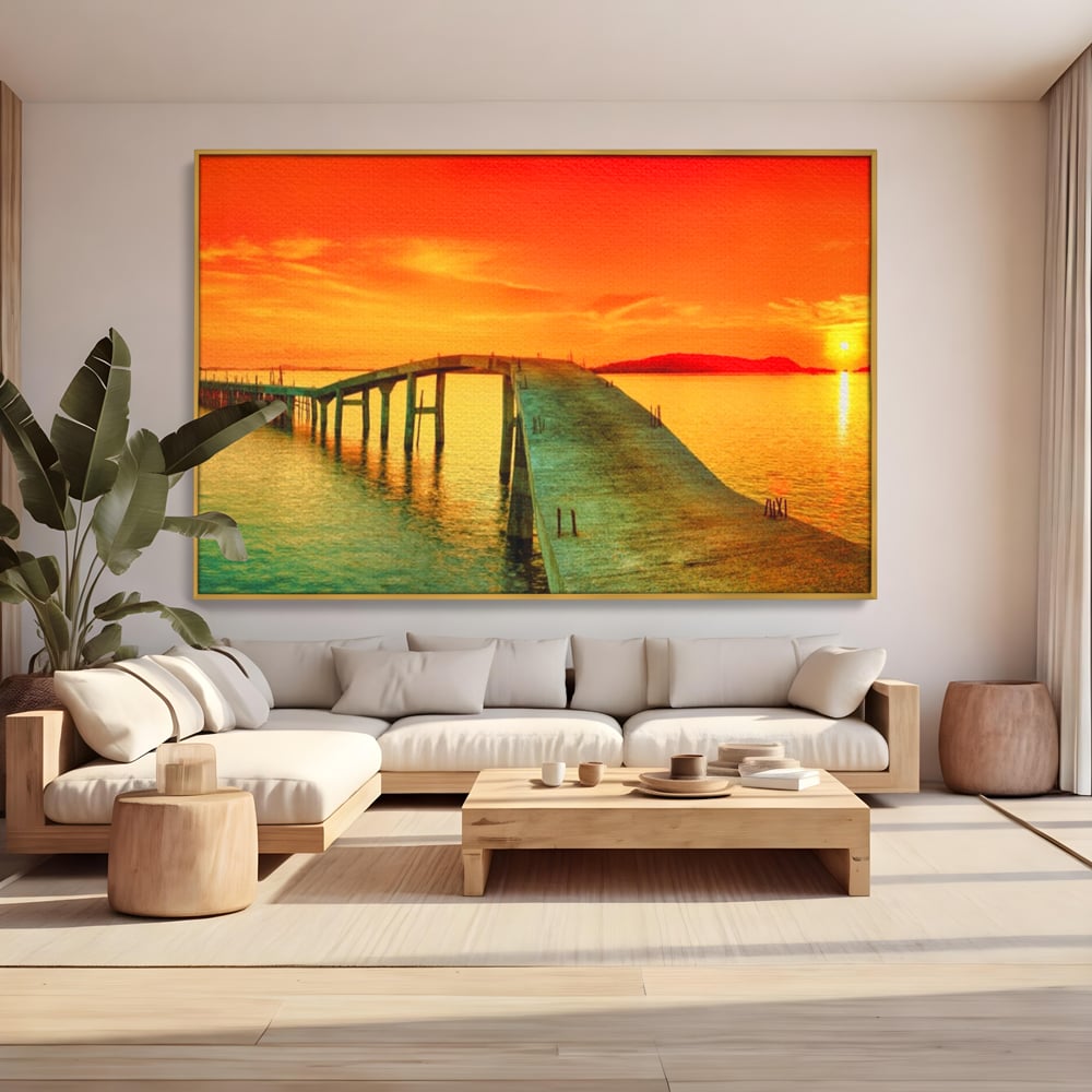 Tablou canvas cu tablou canvas cu pod si rasarit de soare, in rama de aluminiu auriu, pe perete intr-un living