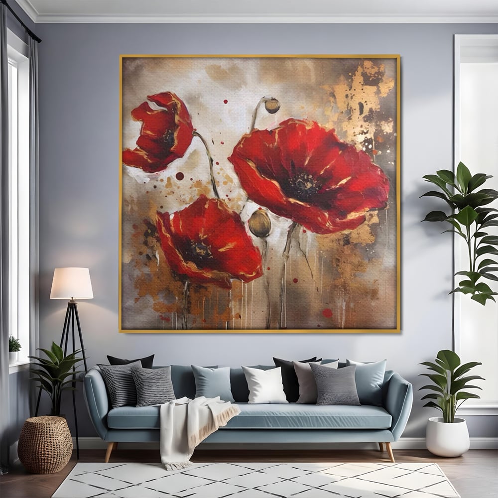 Tablou canvas cu pictura decorativa cu maci rosii, in rama de aluminiu auriu, pe perete intr-un living