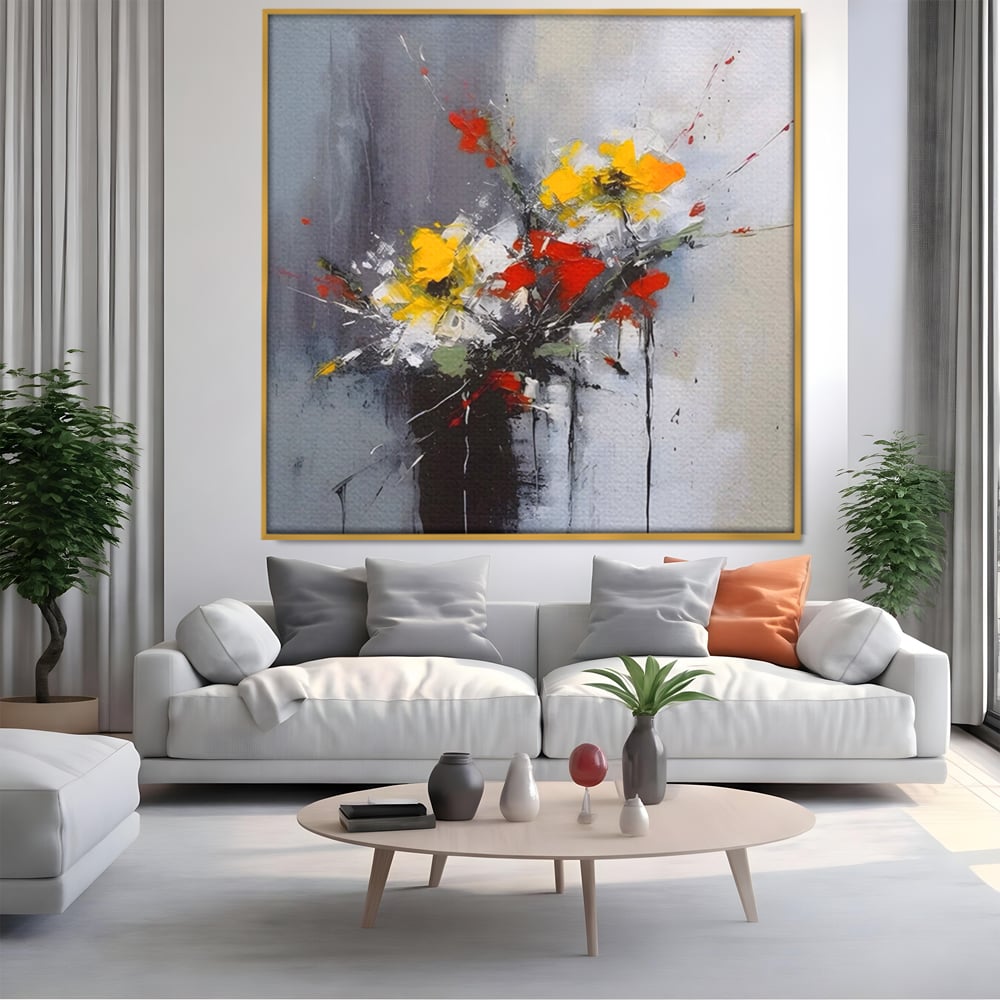 Tablou canvas cu tablou pictat abstract cu flori, in rama de aluminiu auriu, pe perete intr-un living