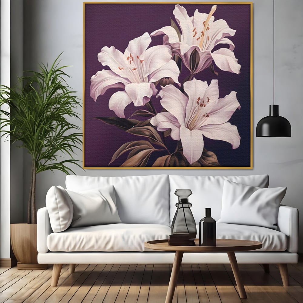 Tablou canvas cu tablou canvas cu trei crini albi, in rama de aluminiu auriu, pe perete intr-un living