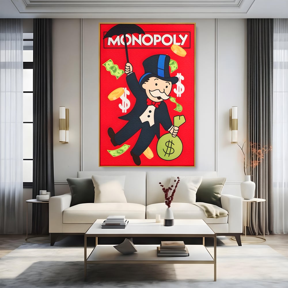 Tablou canvas cu tablou canvas cu domnul monopoly pe fond rosu, in rama de aluminiu auriu, pe perete intr-un living