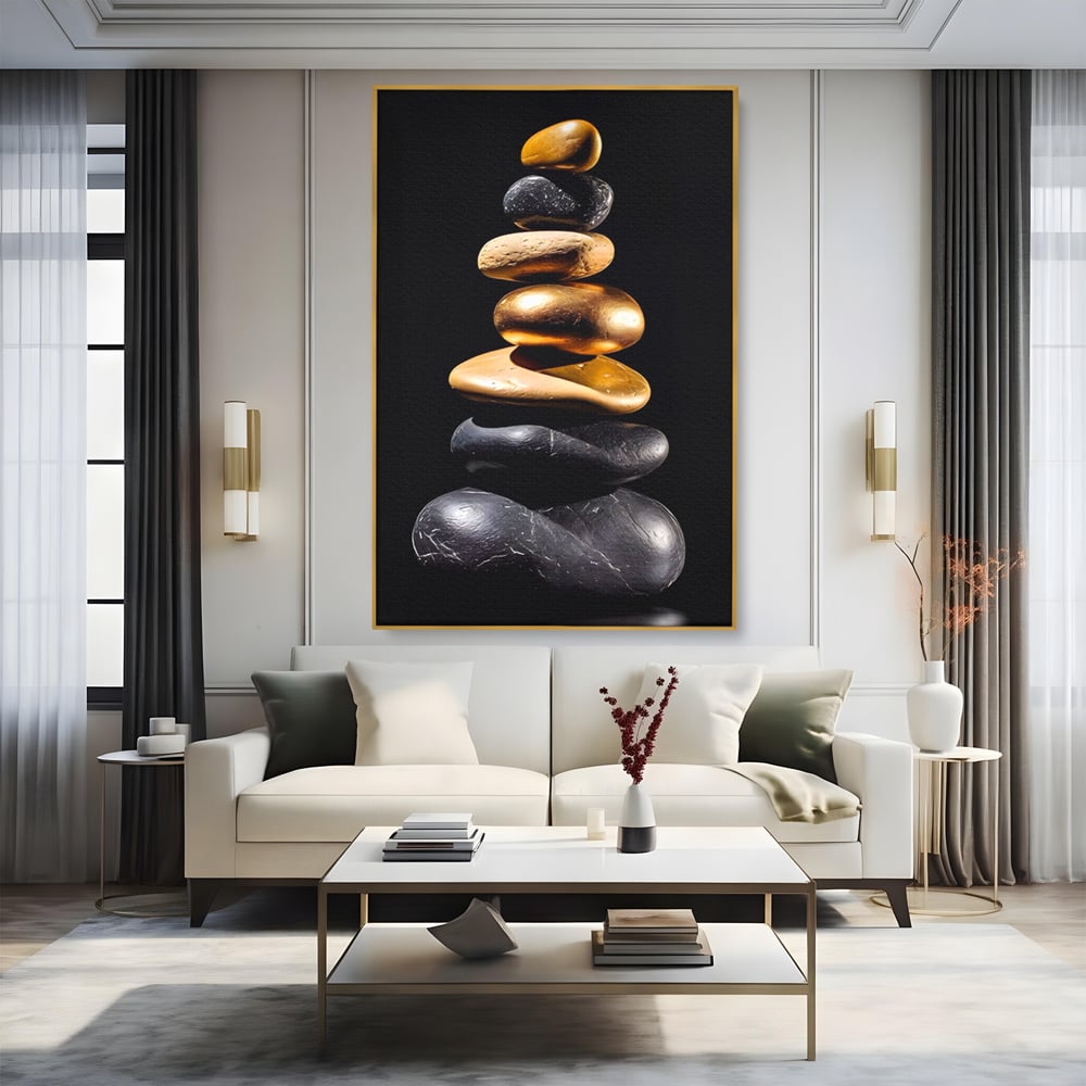 Tablou canvas cu turn vertical din pietre suprapuse, in rama de aluminiu auriu, pe perete intr-un living