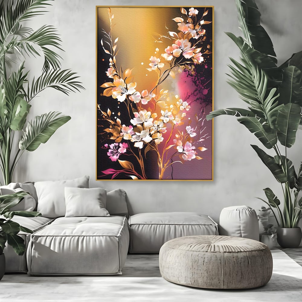 Tablou canvas cu pictura verticala cu ramura inflorita, in rama de aluminiu auriu, pe perete intr-un living