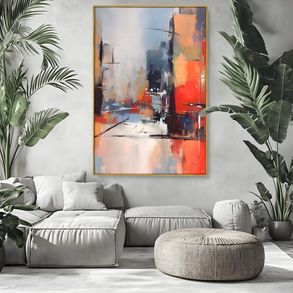 Tablou canvas cu pictura abstracta cu oras si cladiri, in rama de aluminiu auriu, pe perete intr-un living
