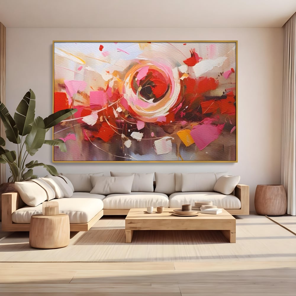 Tablou canvas cu tablou canvas cu floare abstracta si culori vibrante, in rama de aluminiu auriu, pe perete intr-un living