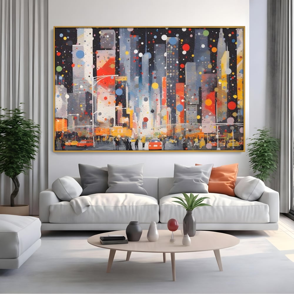 Tablou canvas cu pictura abstracta cu peisaj urban nocturn, in rama de aluminiu auriu, pe perete intr-un living
