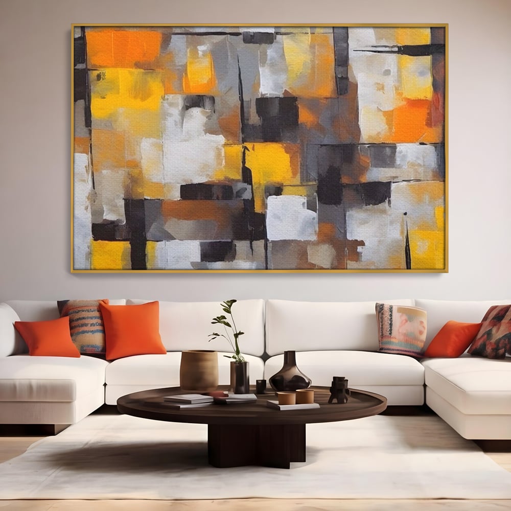 Tablou canvas cu tablou canvas cu patrate abstracte, in rama de aluminiu auriu, pe perete intr-un living