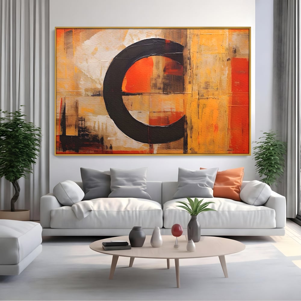 Tablou canvas cu pictura abstracta cu cerc negru, in rama de aluminiu auriu, pe perete intr-un living