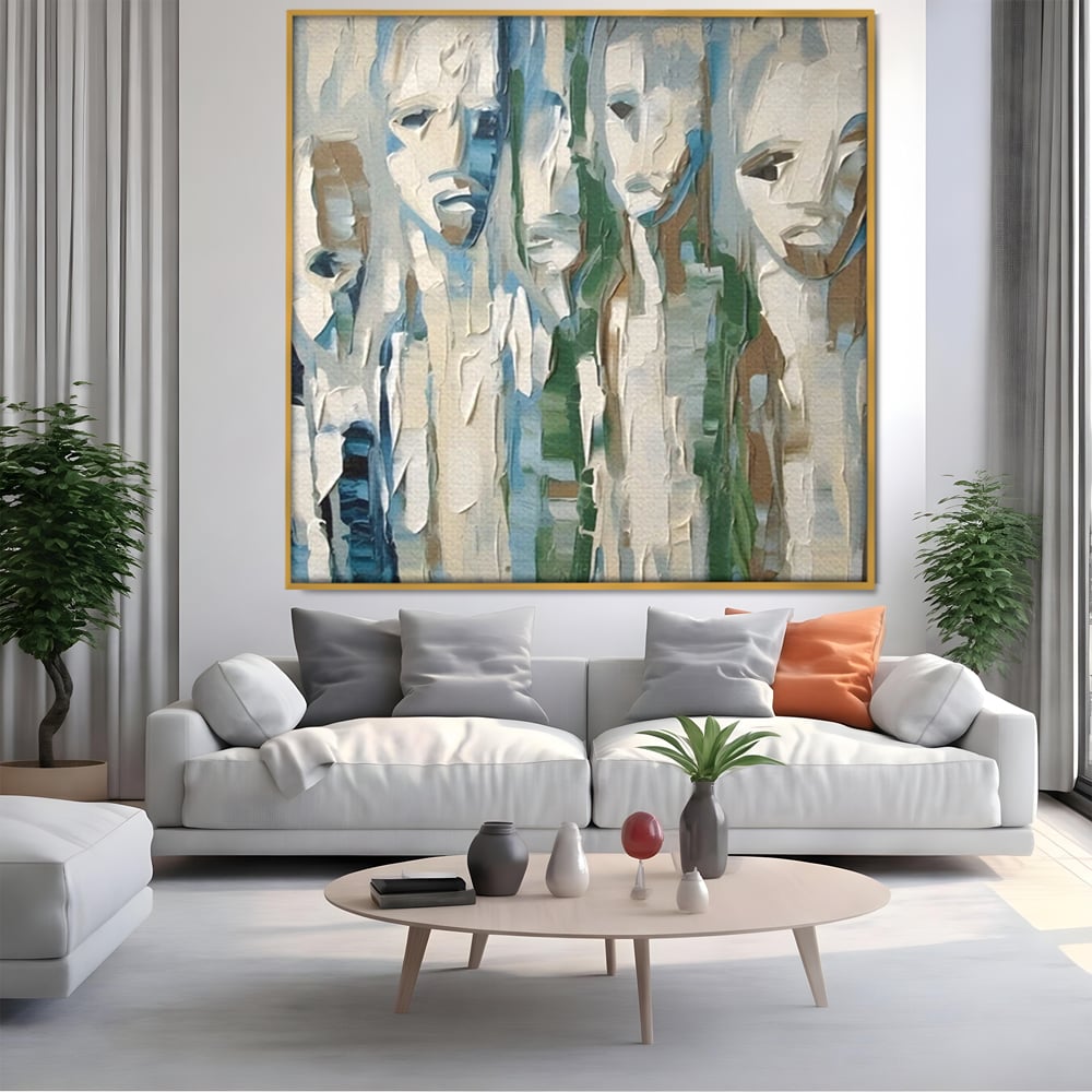 Tablou canvas cu tablou canvas cu fete abstracte, in rama de aluminiu auriu, pe perete intr-un living