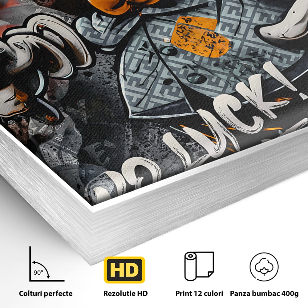 Detaliu al suprafetei: tablou canvas cu donald duck revoltat, in rama de aluminiu argintiu