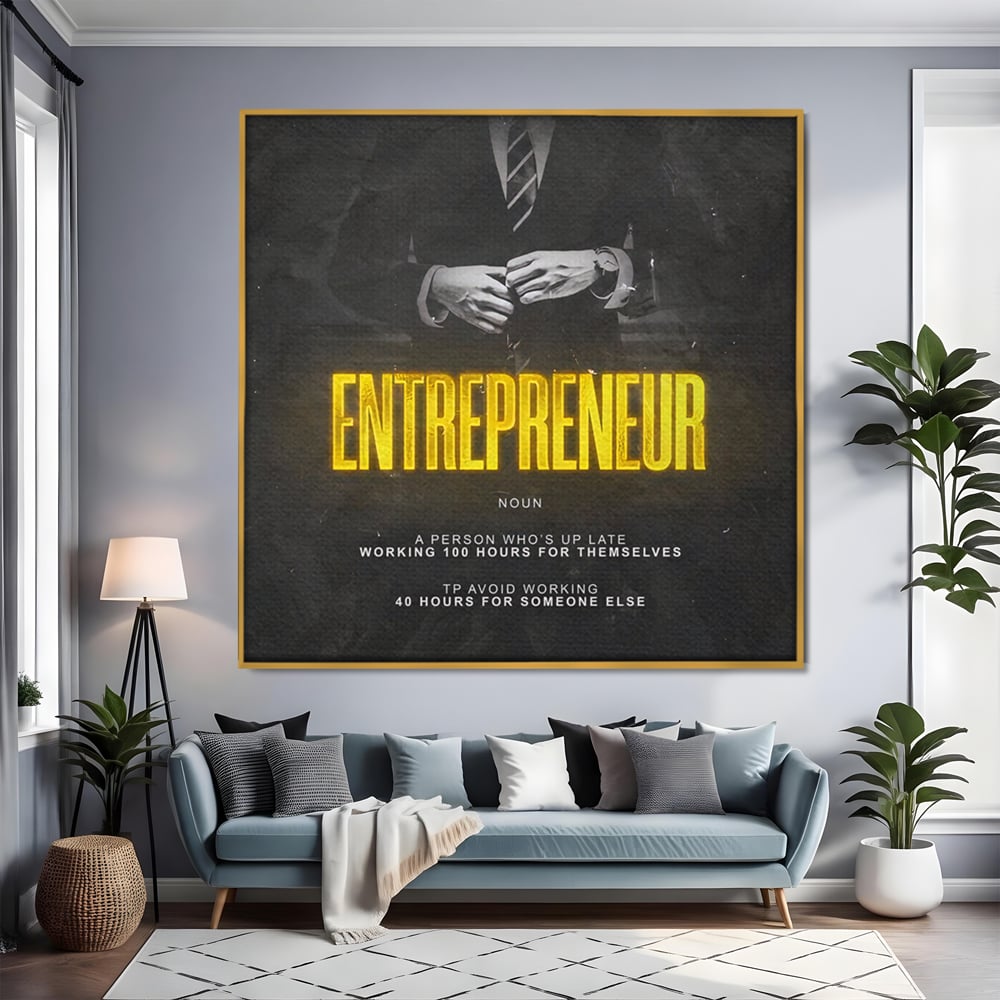 Tablou canvas cu ilustratie motivationala cu text si costum, in rama de aluminiu auriu, pe perete intr-un living