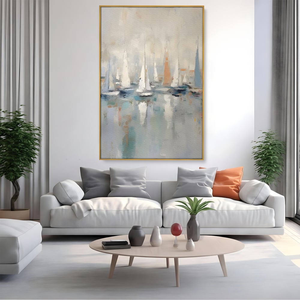 Tablou canvas cu pictura abstracta cu barci cu panze, in rama de aluminiu auriu, pe perete intr-un living