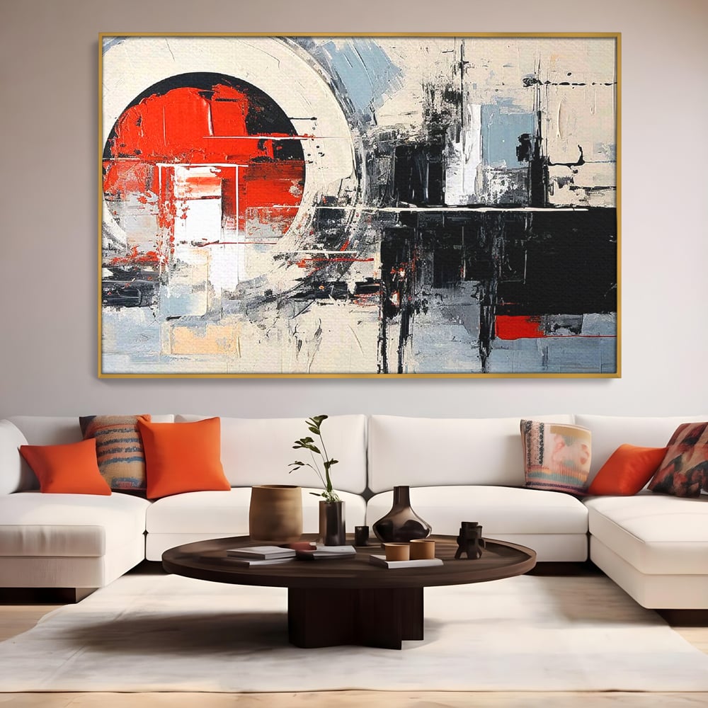 Tablou canvas cu tablou canvas cu cerc rosu si geometrie abstracta, in rama de aluminiu auriu, pe perete intr-un living