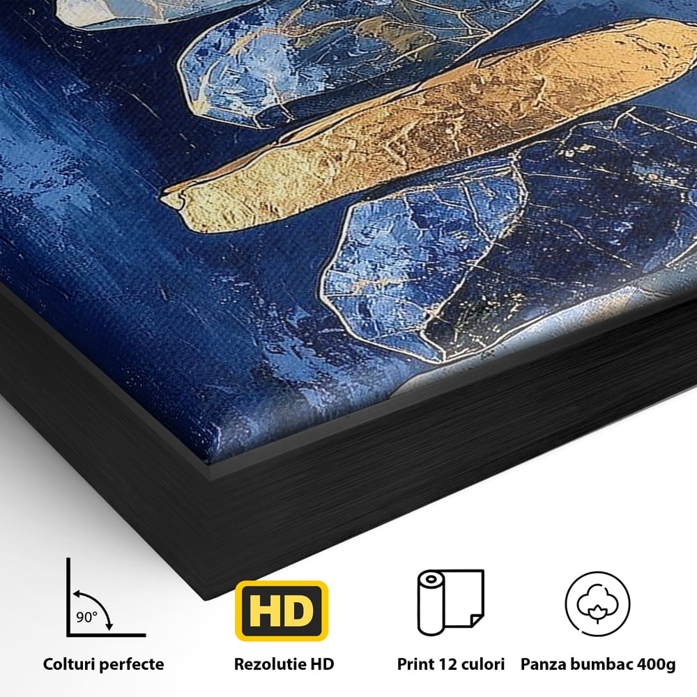 Detaliu al suprafetei: tablou canvas cu stive de pietre si cerc auriu, in rama de aluminiu negru