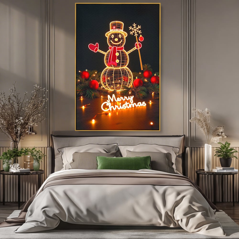 Tablou canvas cu ilustratie cu om de zapada luminos, in rama de aluminiu auriu, pe perete intr-un dormitor