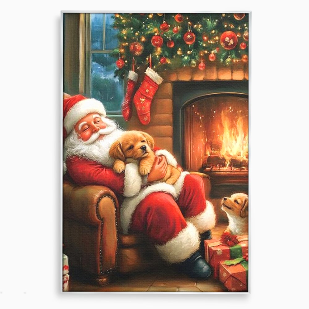 Tablou canvas cu mos craciun cu catelus in fotoliu, in rama de aluminiu argintiu