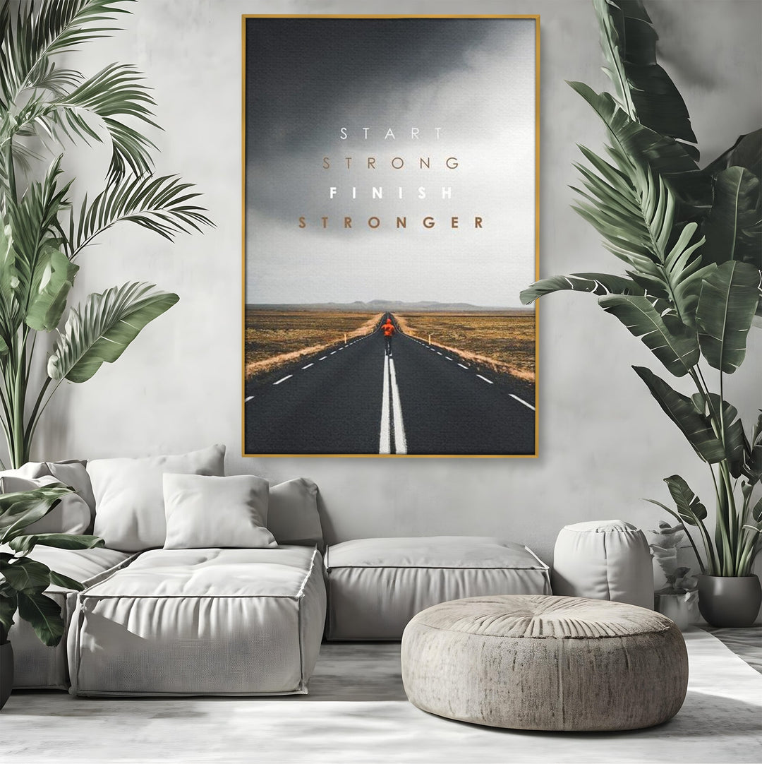 Tablou canvas cu tablou canvas cu alergator pe sosea, in rama de aluminiu auriu, pe perete intr-un living