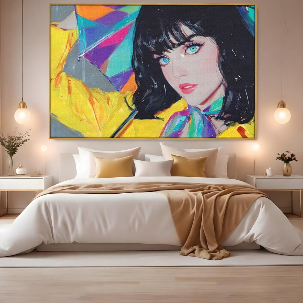 Tablou canvas cu pictura cu femeie bruneta si umbrela colorata, in rama de aluminiu auriu, pe perete intr-un dormitor