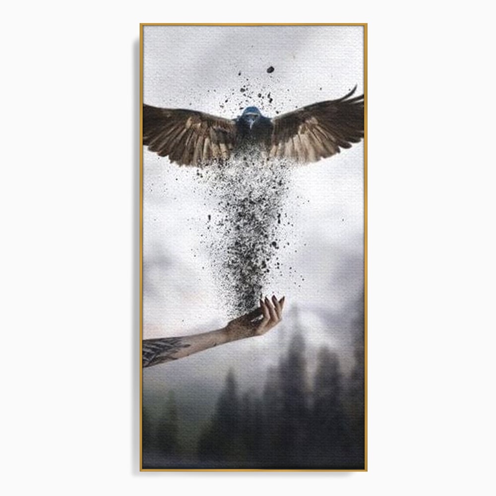 Tablou canvas cu tablou canvas cu pasare si mana din cenusa, in rama de aluminiu auriu