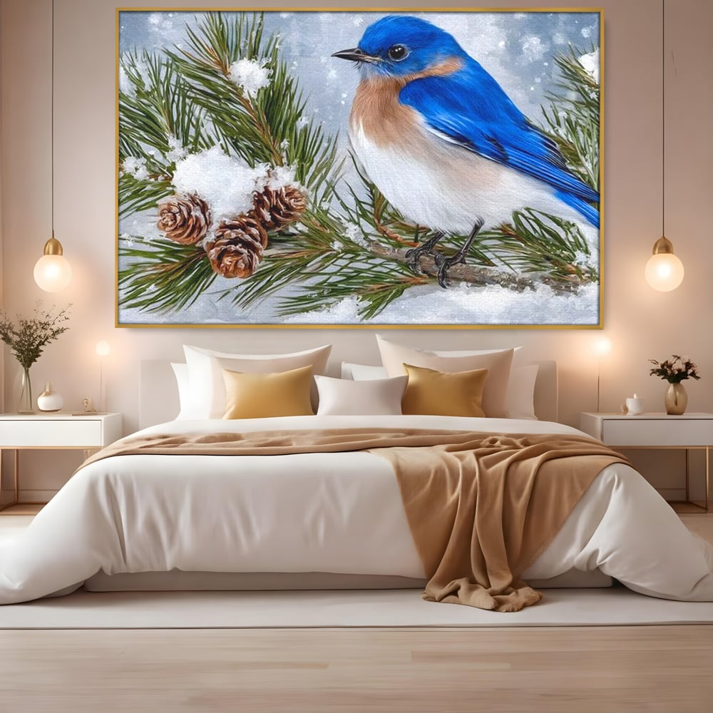 Tablou canvas cu tablou canvas cu pasare albastra pe ramura, in rama de aluminiu auriu, pe perete intr-un dormitor