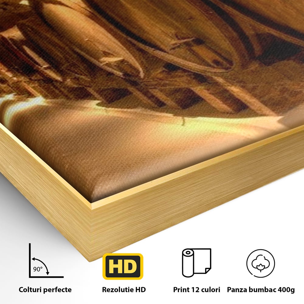 Detaliu al suprafetei: tablou canvas cu butoaie de vin in crama, in rama de aluminiu auriu