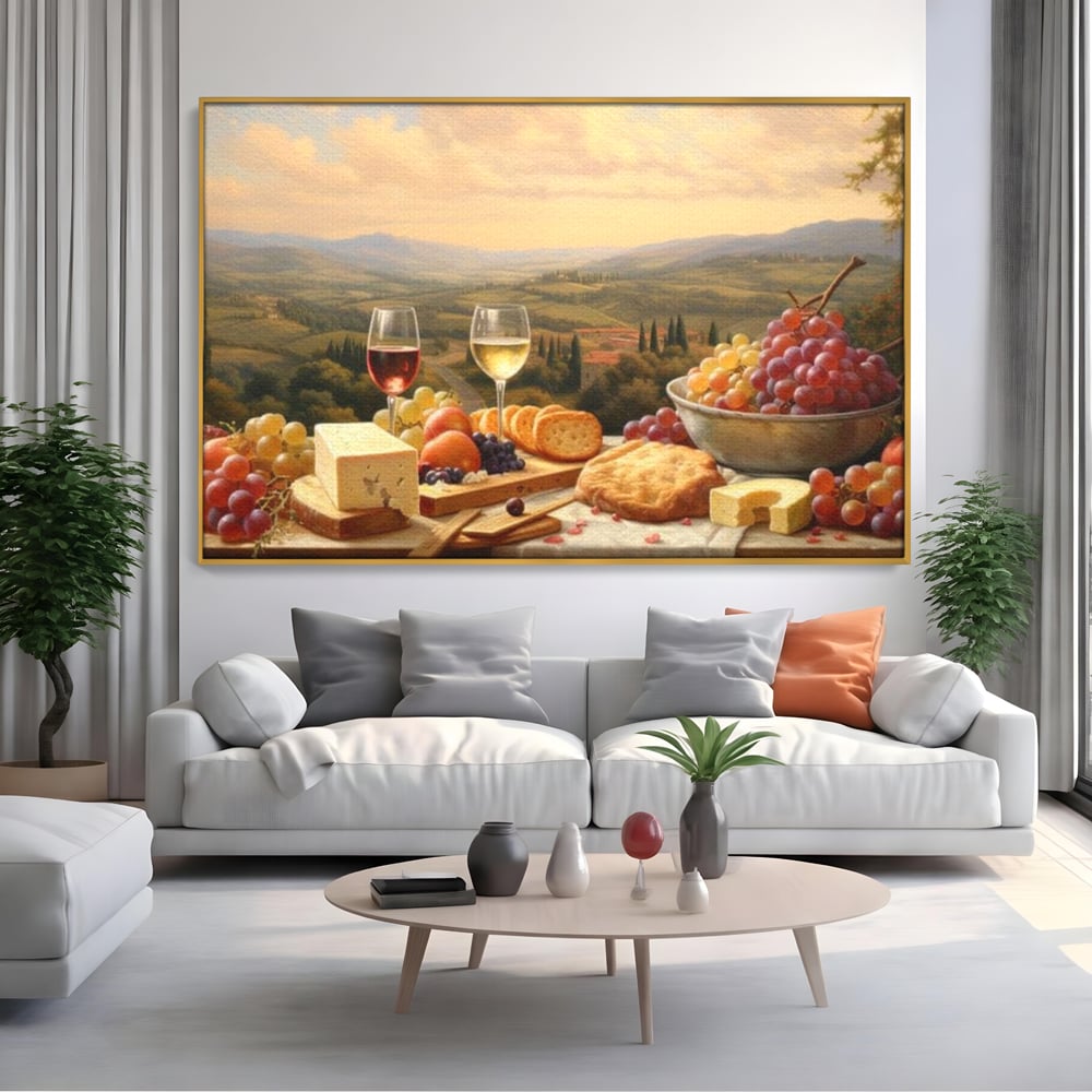 Tablou canvas cu tablou canvas cu peisaj tomnatic si masa imbelsugata, in rama de aluminiu auriu, pe perete intr-un living