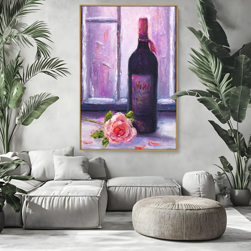 Tablou canvas cu tablou canvas cu sticla de vin si trandafir, in rama de aluminiu auriu, pe perete intr-un living