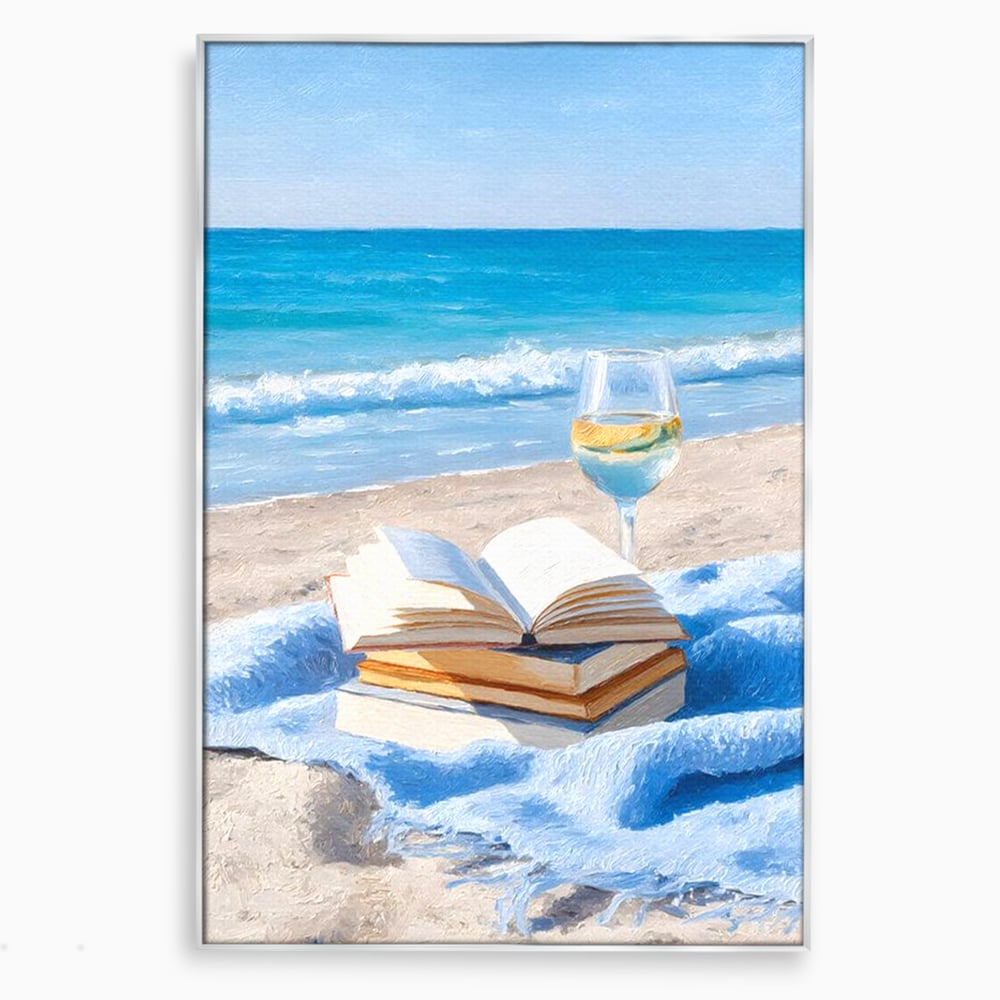 Tablou canvas cu pictura cu carti si pahar de vin pe plaja, in rama de aluminiu argintiu