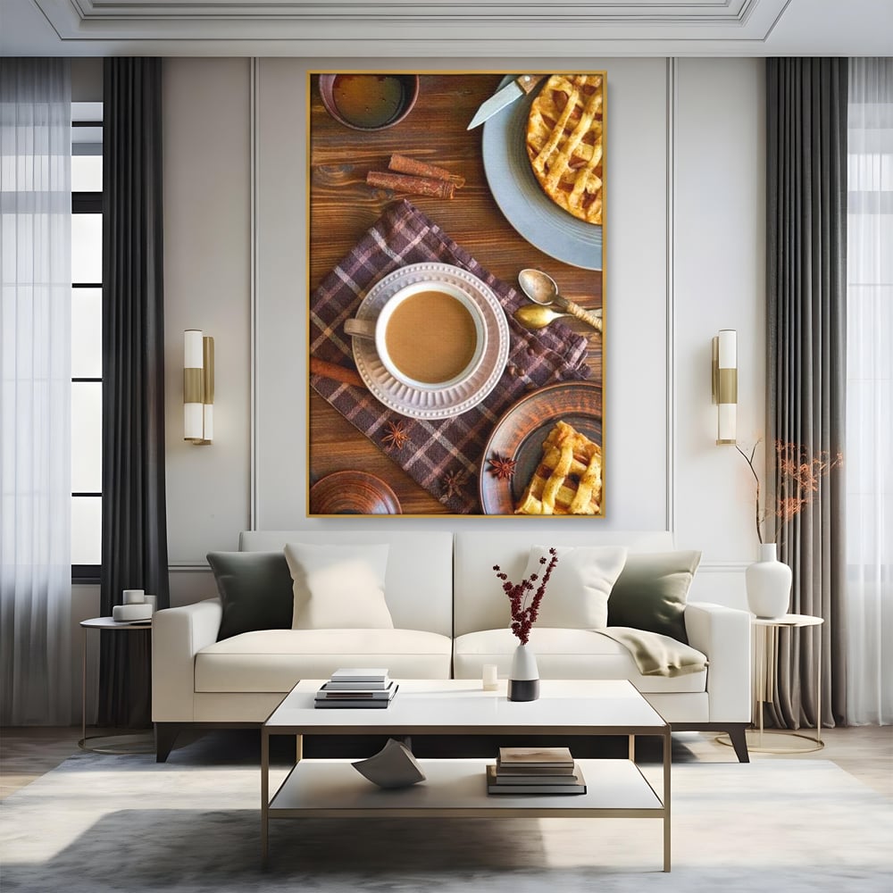 Tablou canvas cu natura moarta cu cafea si placinta, in rama de aluminiu auriu, pe perete intr-un living