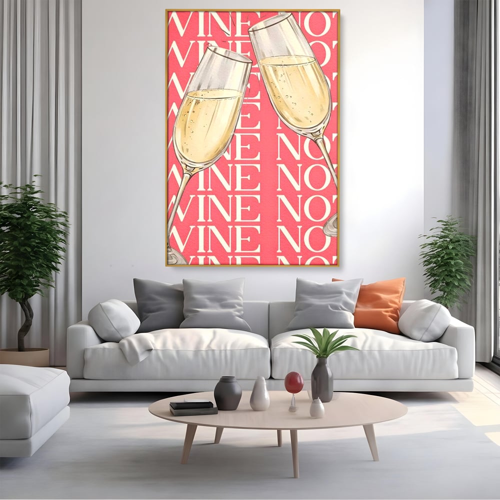 Tablou canvas cu doua pahare cu sampanie si text roz, in rama de aluminiu auriu, pe perete intr-un living