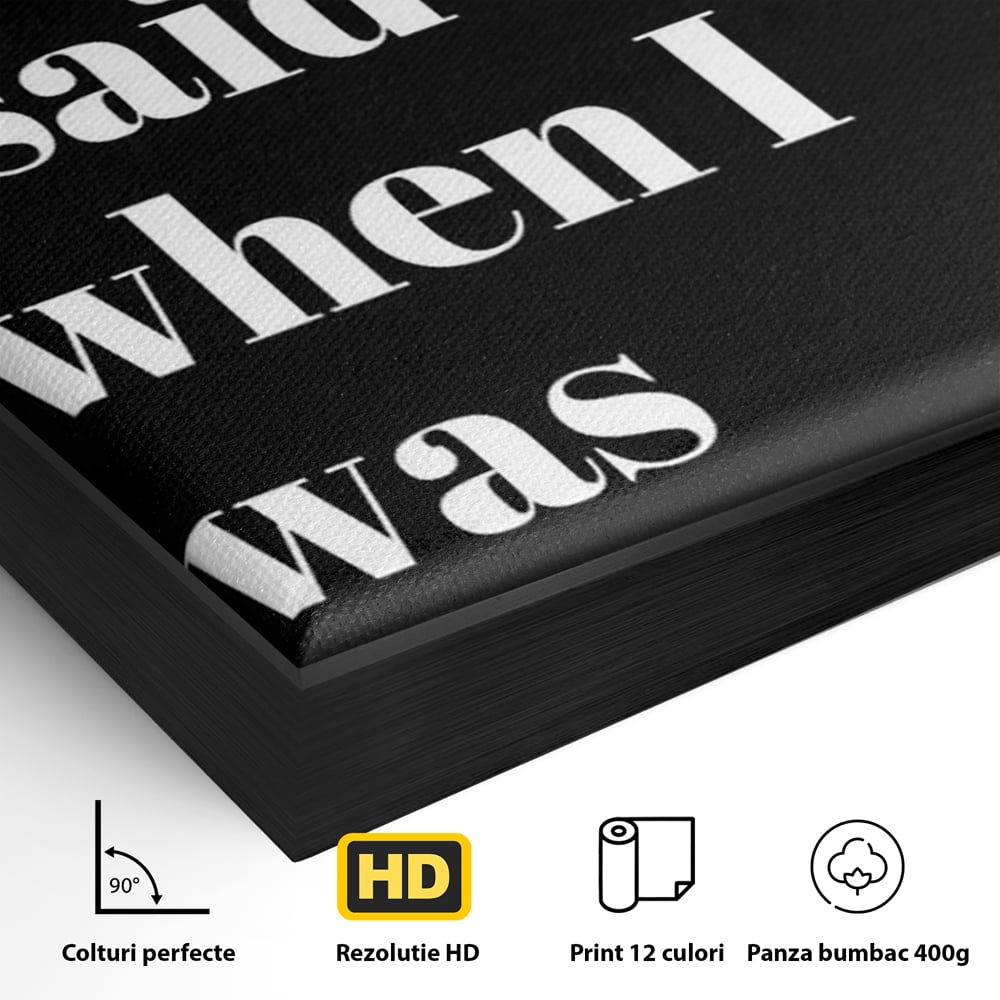 Detaliu al suprafetei: tablou canvas cu mesaj text amuzant pe fond negru, in rama de aluminiu negru