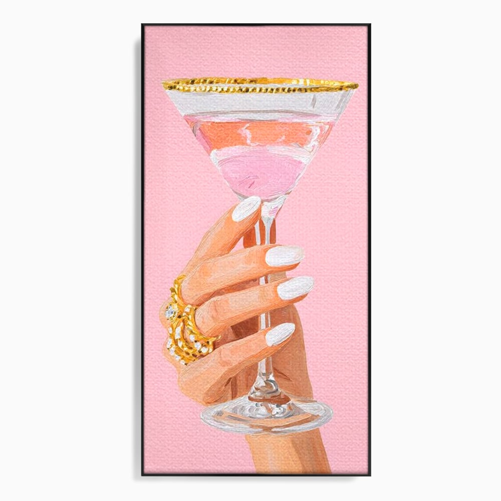 Tablou canvas cu ilustratie cu mana care tine pahar de cocktail, in rama de aluminiu negru