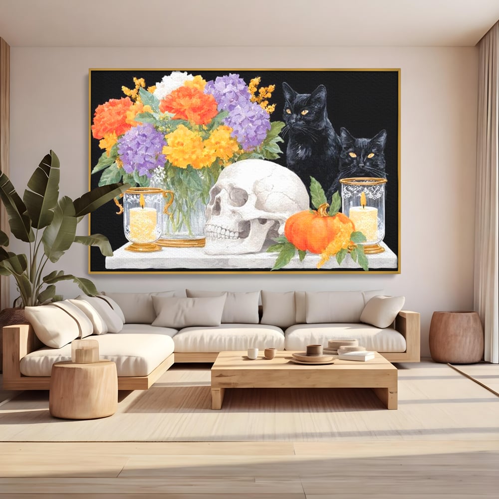 Tablou canvas cu tablou canvas cu pisici negre si craniu, in rama de aluminiu auriu, pe perete intr-un living