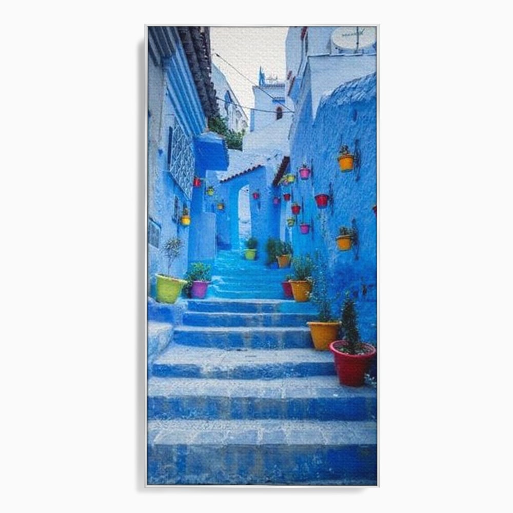 Tablou canvas cu tablou canvas cu straduta albastra din maroc, in rama de aluminiu argintiu