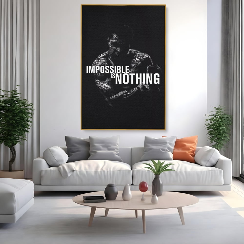 Tablou canvas cu tablou canvas cu silueta masculina si text motivational, in rama de aluminiu auriu, pe perete intr-un living