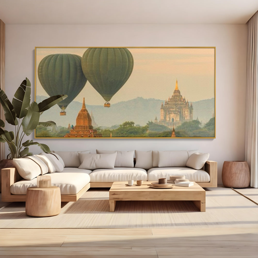 Tablou canvas cu tablou canvas cu peisaj din bagan, in rama de aluminiu auriu, pe perete intr-un living
