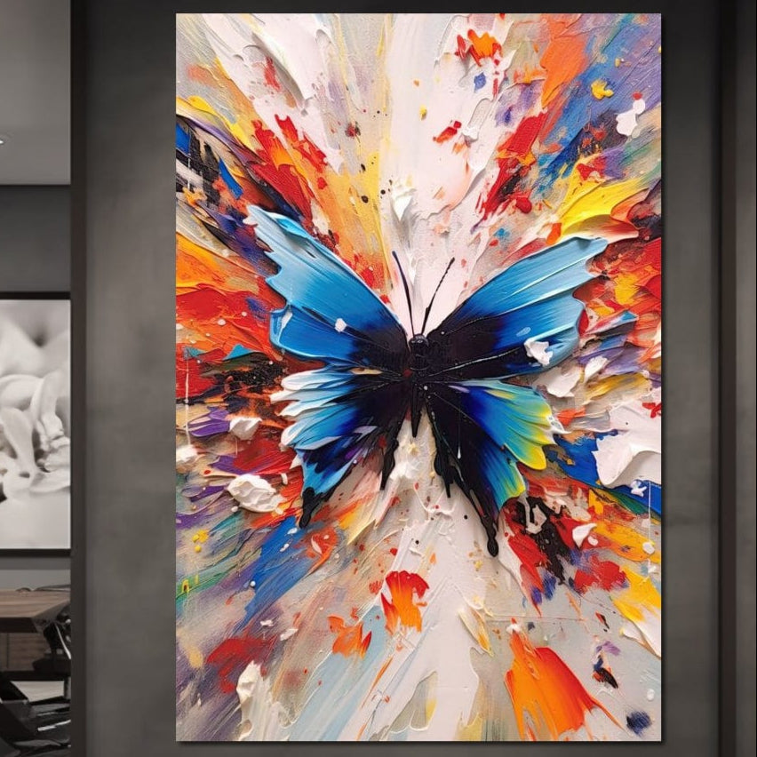 tablou canvas cu un fluture albastru centrat intr-o explozie de culori vii pe fundal alb texturat
