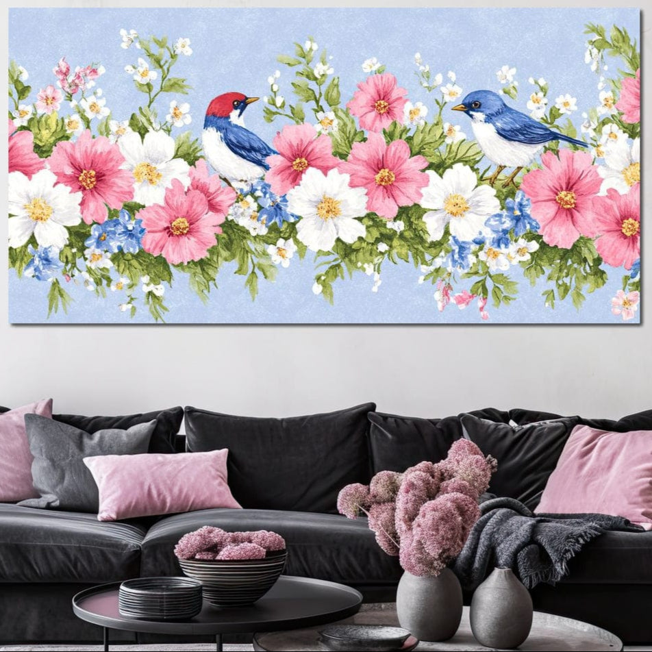 tablou canvas cu doua pasari colorate pe o creanga cu flori roz si albe