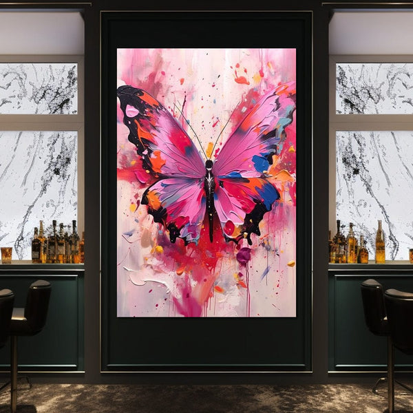 tablou canvas cu un fluture mare si roz, pe fundal abstract stil pictura in stropi de culoare