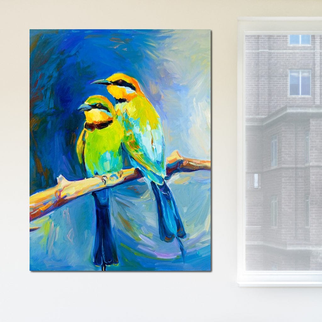 tablou canvas cu doua pasari exotice galben-verzui pe creanga, pe fundal albastru
