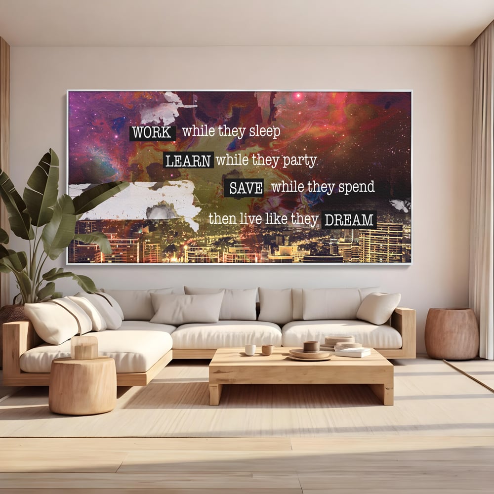 Tablou canvas cu tablou motivational cu oras si cer cosmic, in rama de aluminiu argintiu, pe perete intr-un living