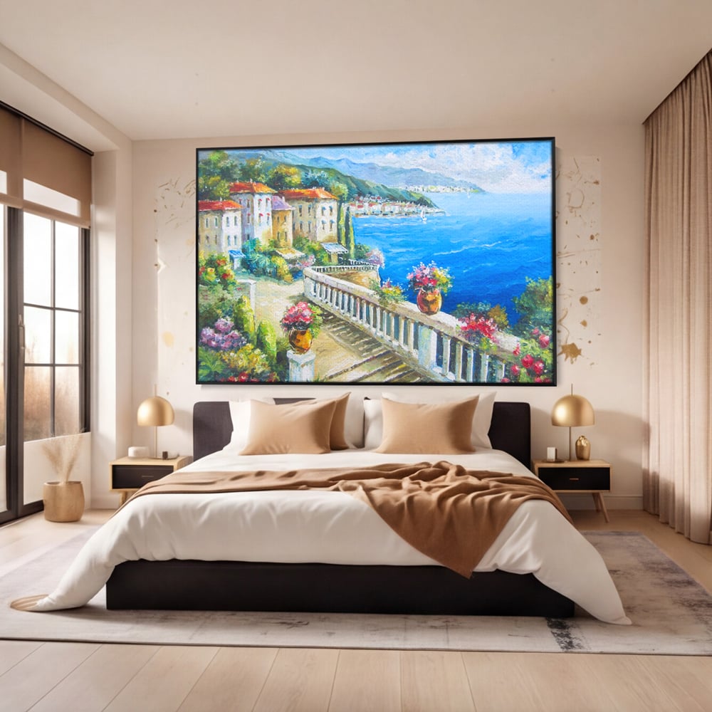 Tablou canvas cu pictura case pe malul marii, in rama de aluminiu negru, pe perete intr-un dormitor