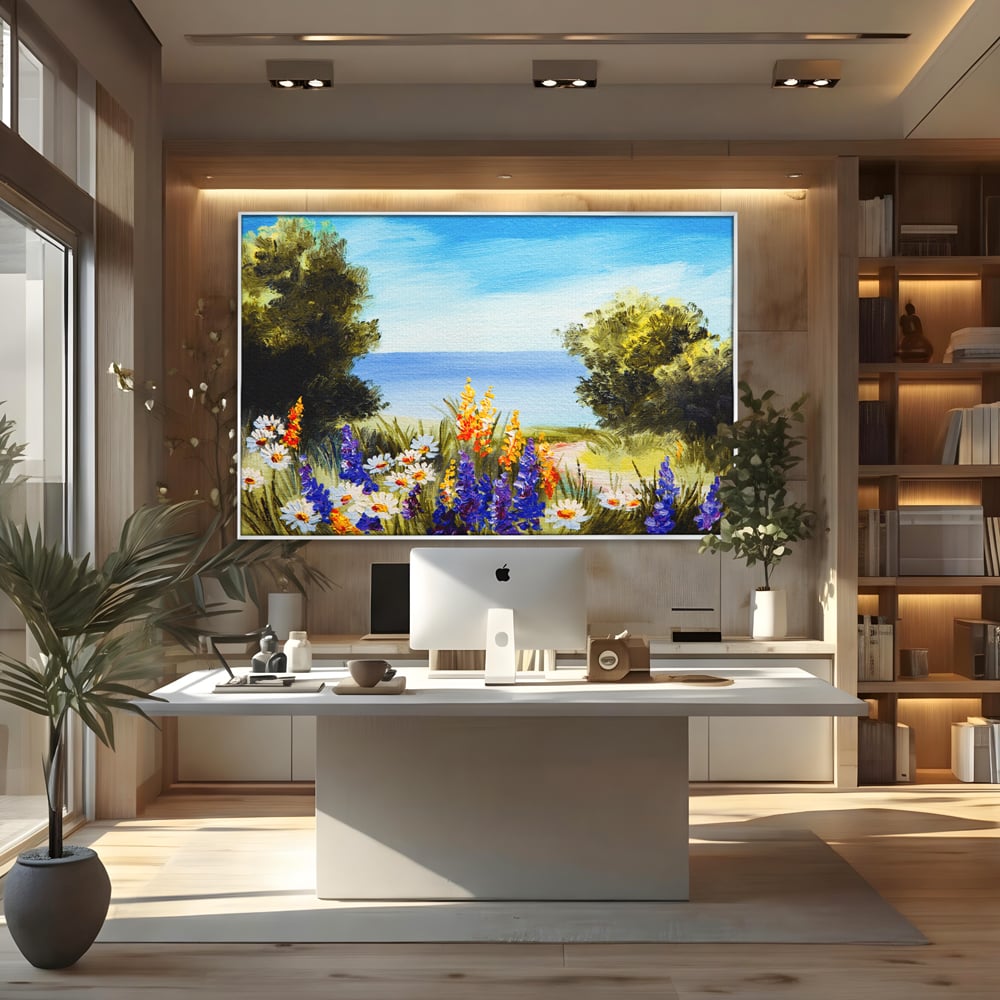 Tablou canvas cu tablou canvas cu peisaj marin si flori de camp, in rama de aluminiu argintiu, pe perete intr-un birou