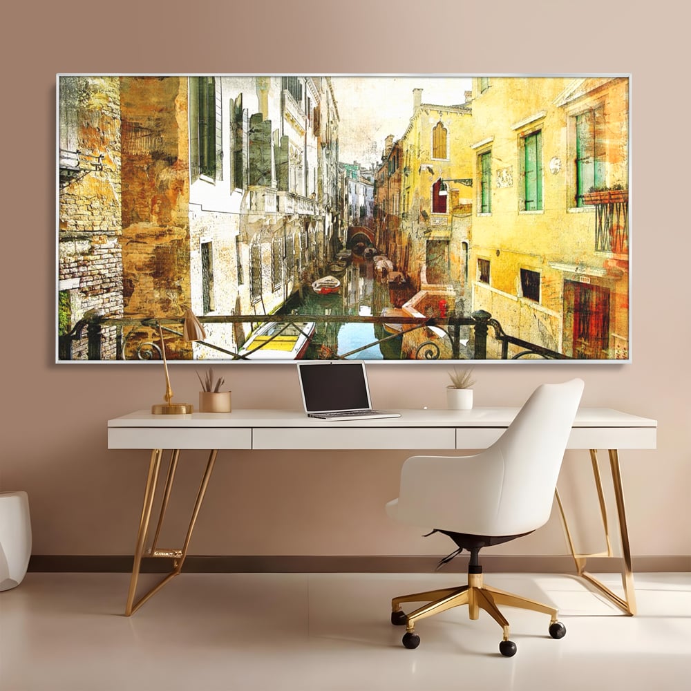 Tablou canvas cu tablou canvas cu peisaj venetian, in rama de aluminiu argintiu, pe perete intr-un birou