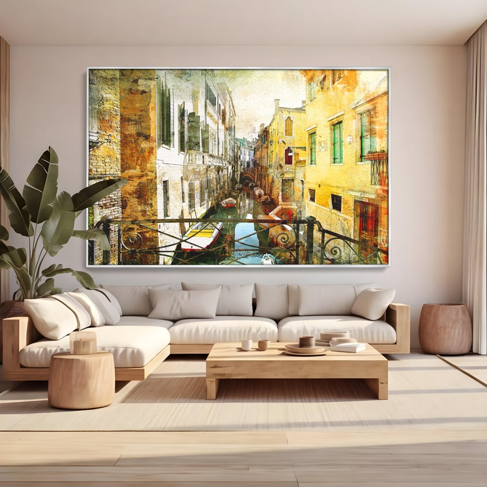Tablou canvas cu tablou canvas cu peisaj venetian, in rama de aluminiu argintiu, pe perete intr-un living
